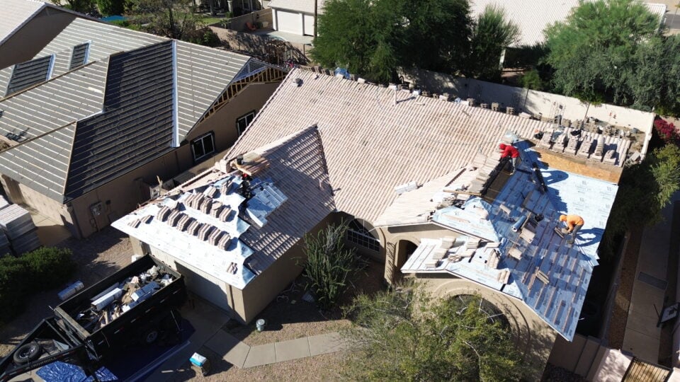 A residential roof being replaced