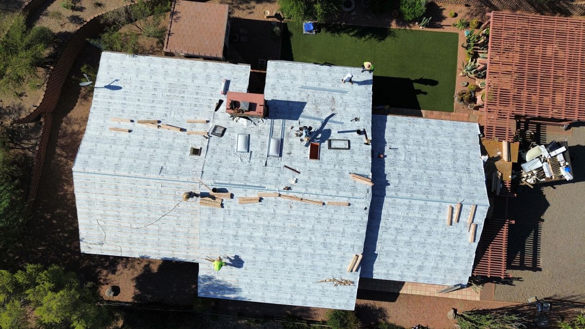 Aerial view of a roof being replaced