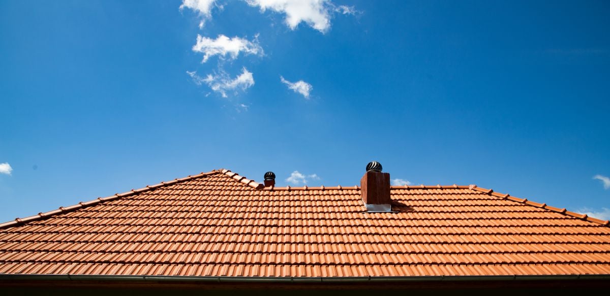red tiles roof and blue sky